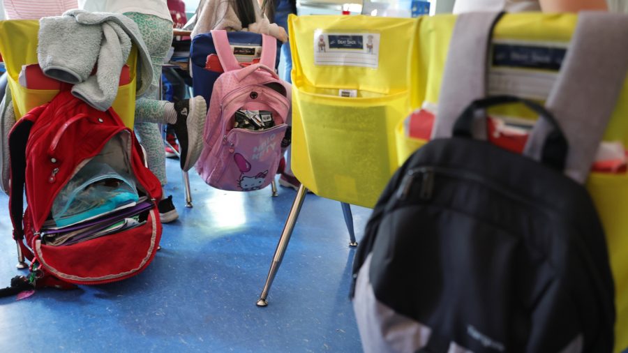 NEW YORK, NEW YORK - JUNE 24: Student backpacks hang on the backs of classroom chairs on the second to last day of school as New York City public schools prepare to wrap up the year at Yung Wing School P.S. 124 on June 24, 2022 in New York City. Approximately 75% of NYC public schools enrolled fewer students for the 2021/2022 school year due to the pandemic.  (Photo by Michael Loccisano/Getty Images)