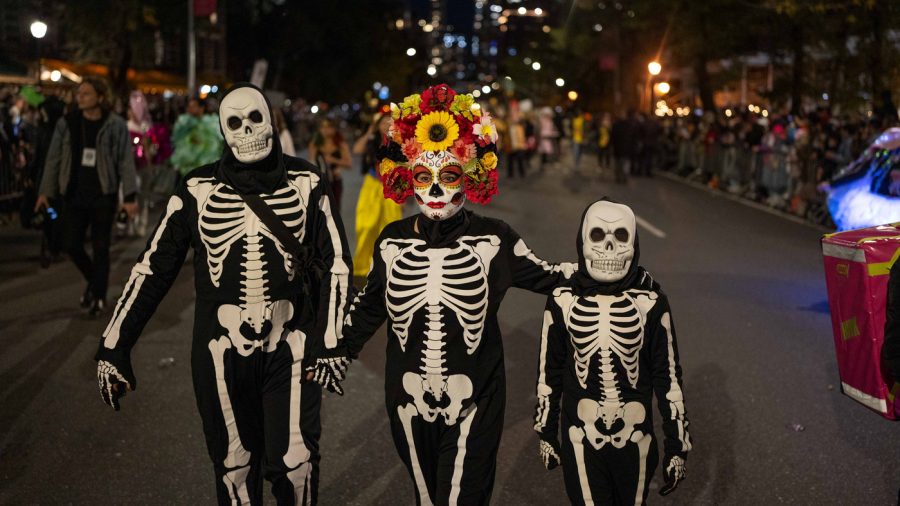 Halloween revelers dressed in costumes march in New York City's 48th annual Greenwich Village Halloween Parade, Sunday, Oct. 31, 2021, in New York. (AP Photo/Dieu-Nalio Chery)